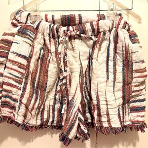 Boutique shorts by THML. Size M. Fringe on bottom, tie at the elastic waist.